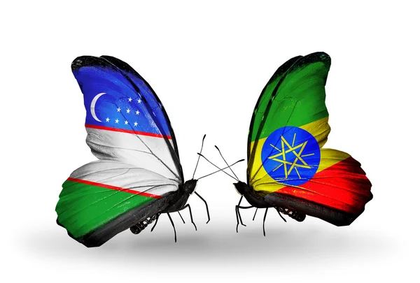 Mariposas con banderas de Uzbekistán y Etiopía — Foto de Stock