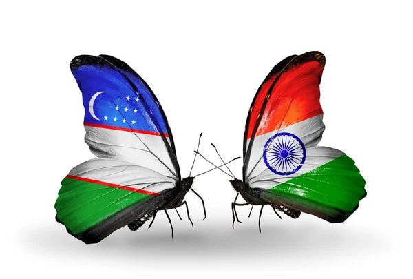 Butterflies with Uzbekistan and India flags — Stock Photo, Image