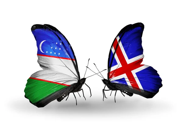 Butterflies with Uzbekistan and Iceland flags — Stock Photo, Image