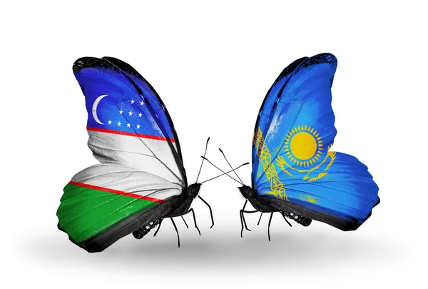 Borboletas com bandeiras do Uzbequistão e do Cazaquistão — Fotografia de Stock