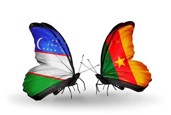 Kelebekler Özbekistan ve Kamerun bayrağı ile — Stok fotoğraf