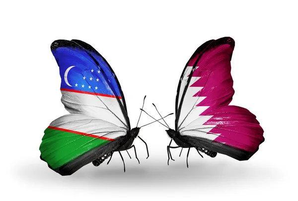 Motyle z Uzbekistanu i Katar flagi — Zdjęcie stockowe