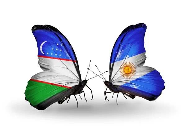 Papillons avec drapeaux Ouzbékistan et Argentine — Photo