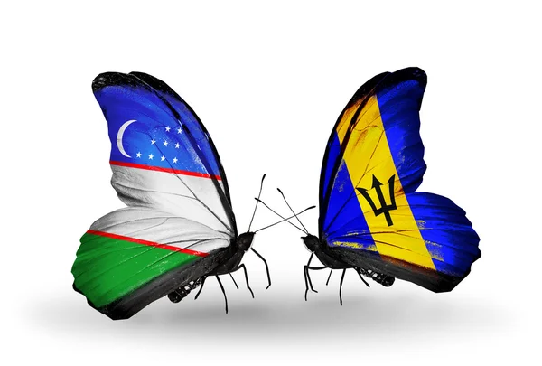 蝴蝶与乌兹别克斯坦和巴巴多斯国旗 — 图库照片