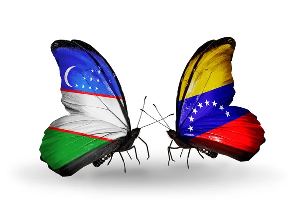 ウズベキスタン、ベネズエラのフラグと蝶 — ストック写真