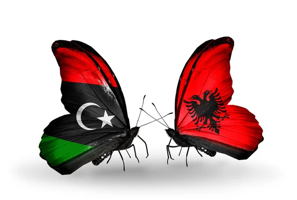 Mariposas con banderas de Libia y Albania — Foto de Stock