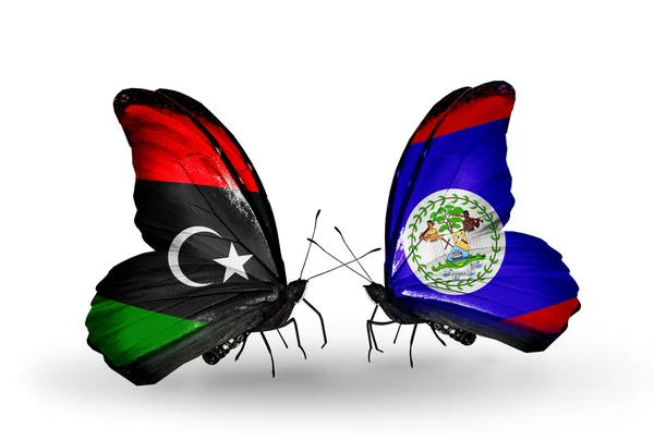 Butterflies with Libya and Belize flags — Stock Photo, Image