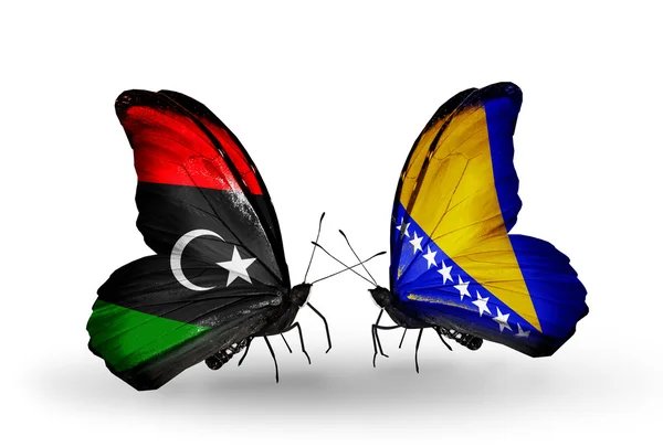 Papillons avec drapeaux Libye et Bosnie-Herzégovine — Photo
