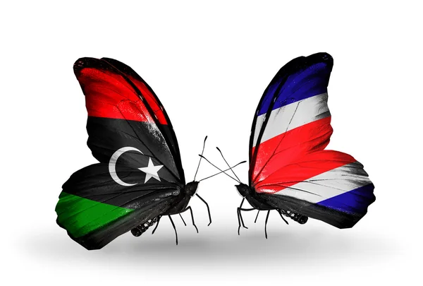 Butterflies with Libya and Costa Rica flags — Stock Photo, Image