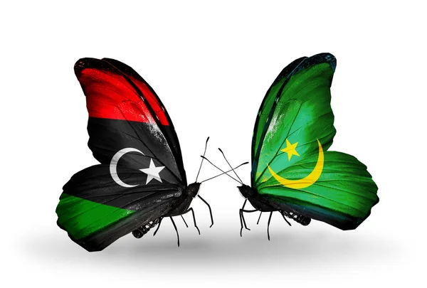 Fjärilar med Libyen och Mauretanien flaggor — Stockfoto