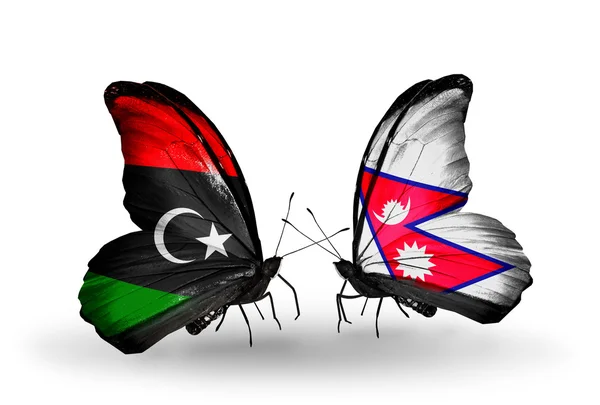 Mariposas con banderas de Libia y Nepal — Foto de Stock