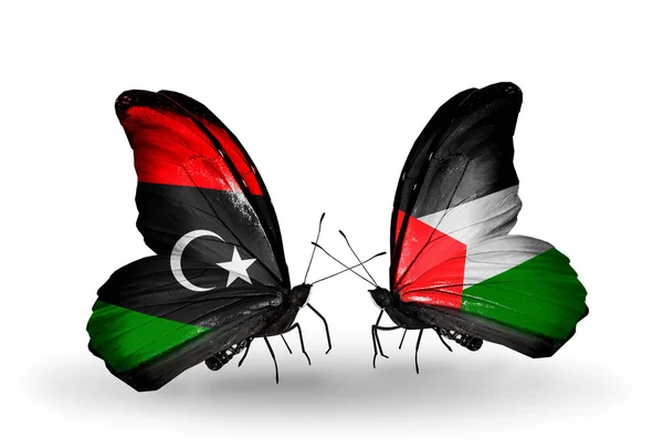 Butterflies with Libya and Palestine flags — Stock Photo, Image