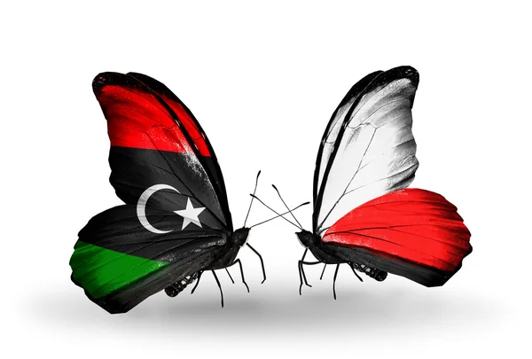 Vlinders met Libië en Polen vlaggen — Stockfoto