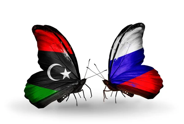 蝴蝶与利比亚和俄罗斯国旗 — 图库照片