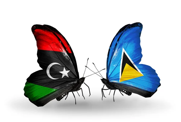 Mariposas con banderas de Libia y Santa Lucía — Foto de Stock