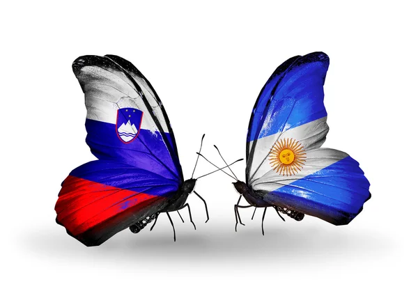 Butterflies with Slovenia and Argentina flags — Stock Photo, Image