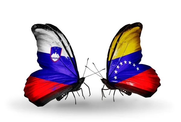 Butterflies with Slovenia and Venezuela flags — Stock Photo, Image