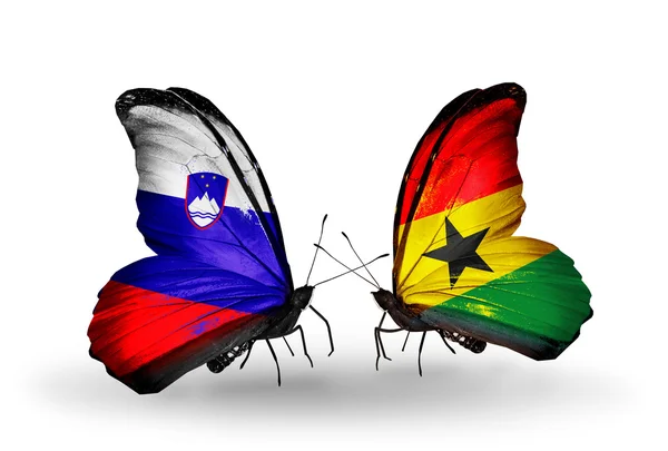 Butterflies with Slovenia and Ghana flags — Stock Photo, Image