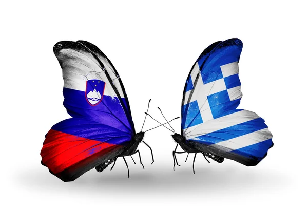 Butterflies with Slovenia and Greece flags — Stock Photo, Image