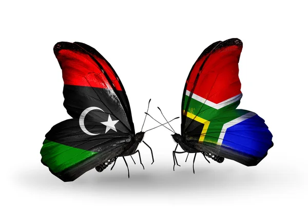 Borboletas com bandeiras da Líbia e África do Sul — Fotografia de Stock