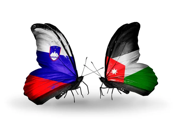 Butterflies with Slovenia and Jordan flags — Stock Photo, Image
