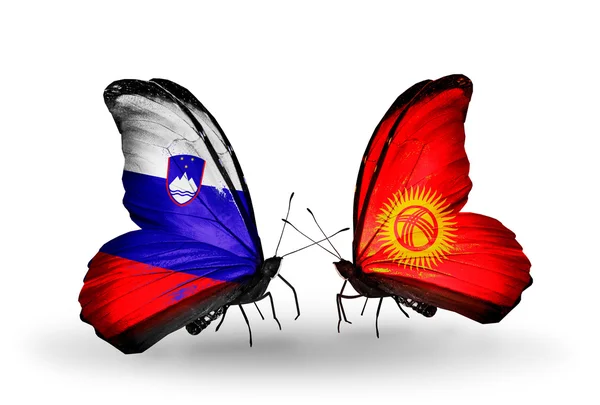 Butterflies with Slovenia and Kirghiz flags — Stock Photo, Image