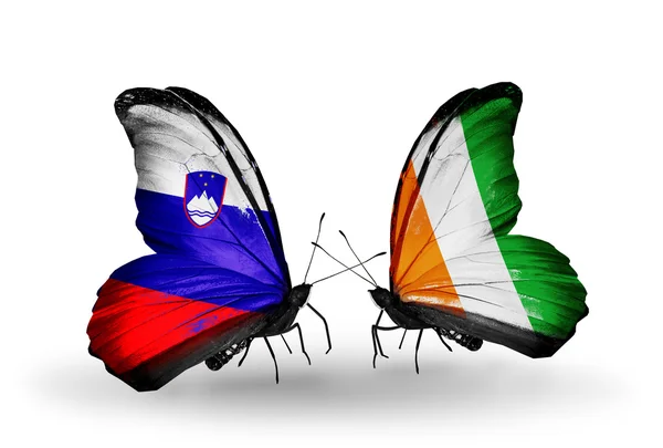 Mariposas con banderas Eslovenia y Costa de Marfil —  Fotos de Stock