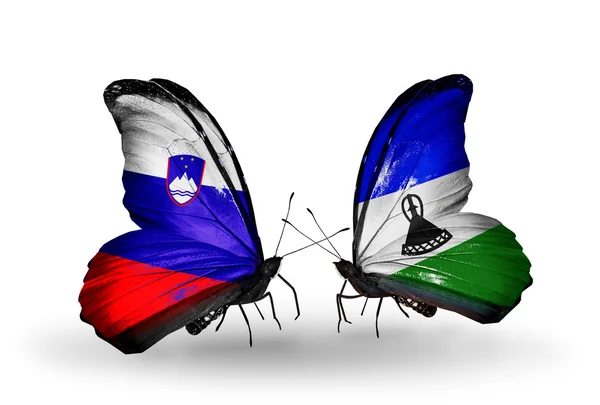 Mariposas con banderas de Eslovenia y Lesotho — Foto de Stock