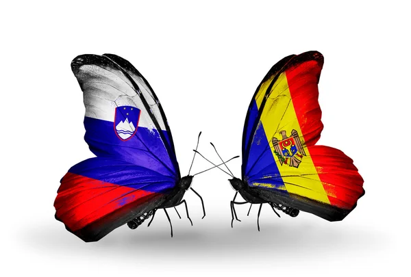 Butterflies with Slovenia and Moldova flags — Stock Photo, Image