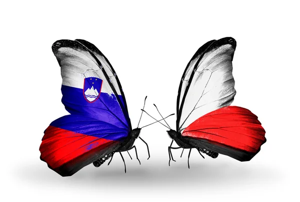 蝴蝶与斯洛文尼亚和波兰国旗 — 图库照片