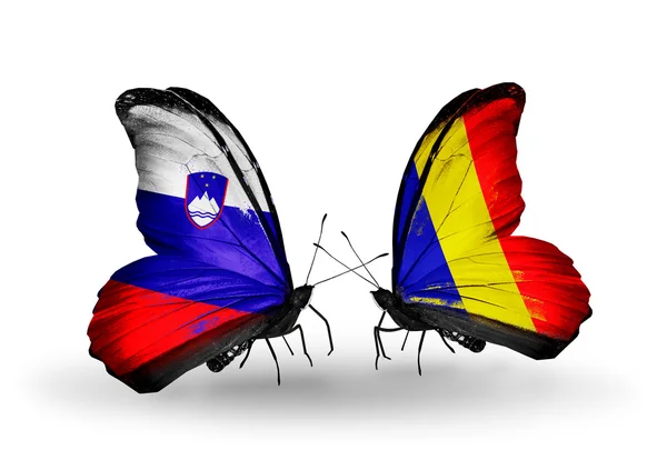 蝴蝶与斯洛文尼亚和乍得，罗马尼亚国旗 — 图库照片