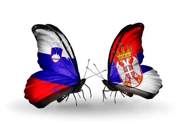 Papillons avec drapeaux Slovénie et Serbie — Photo