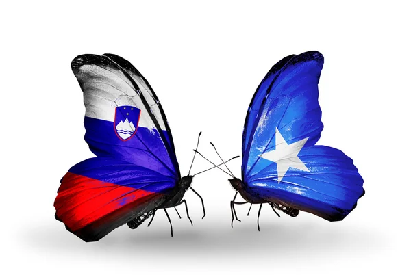 Butterflies with  Slovenia and Somalia flags — Stock Photo, Image