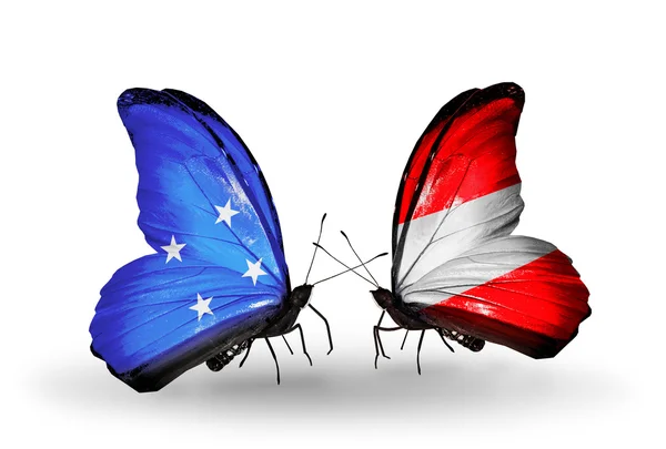 Butterflies with Micronesia and Austria flags — Stock Photo, Image