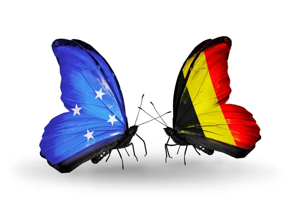 Mariposas con Micronesia y banderas de Bélgica — Foto de Stock