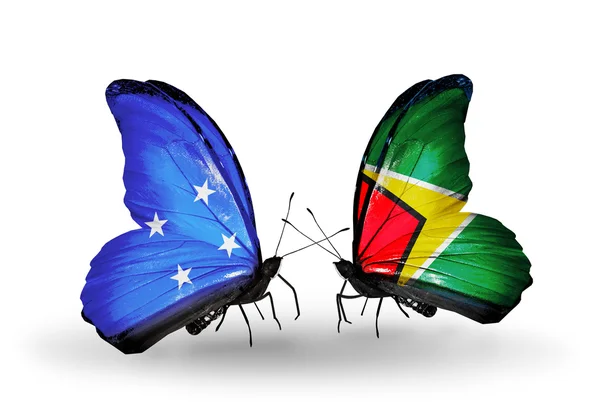 Mariposas con banderas de Micronesia y Guyana — Foto de Stock