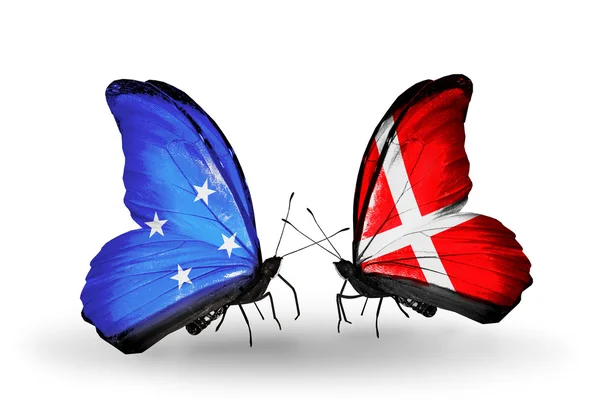 蝴蝶与密克罗尼西亚和丹麦的国旗 — 图库照片