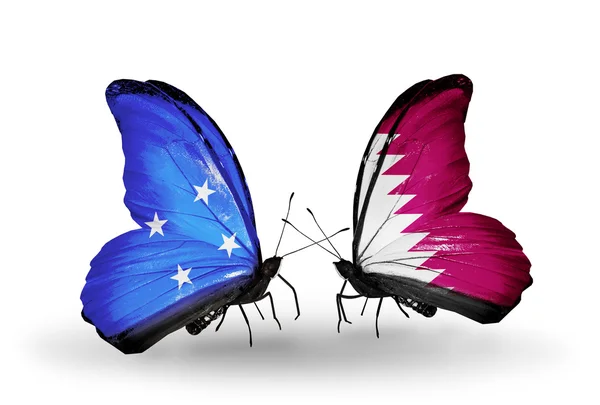 Mariposas con Micronesia y banderas de Qatar — Foto de Stock