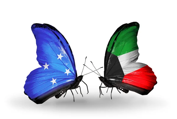 蝴蝶与密克罗尼西亚和科威特国旗 — 图库照片