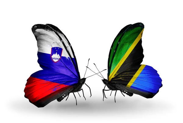 Kelebekler Slovenya ve Tanzanya bayraklı — Stok fotoğraf