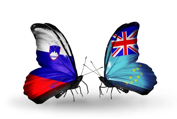 Butterflies with Slovenia and Tuvalu flags — Stock Photo, Image