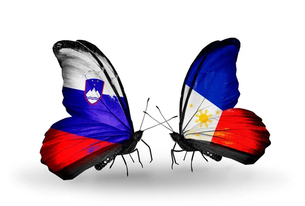 Butterflies with Slovenia and Philippines flags — Stock Photo, Image