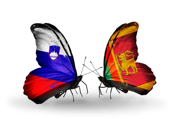 Butterflies with Slovenia and  Sri Lanka flags — Stock Photo, Image