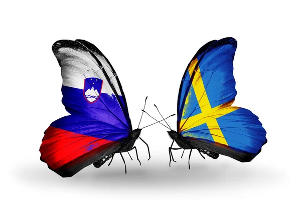 Mariposas con banderas de Eslovenia y Suecia — Foto de Stock