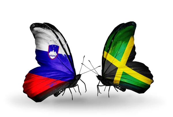 Papillons avec drapeaux Slovénie et Jamaïque — Photo