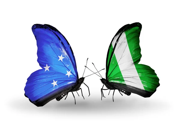 मायक्रोनेशिया आणि नायजेरिया ध्वज सह फुलपाखरू — स्टॉक फोटो, इमेज