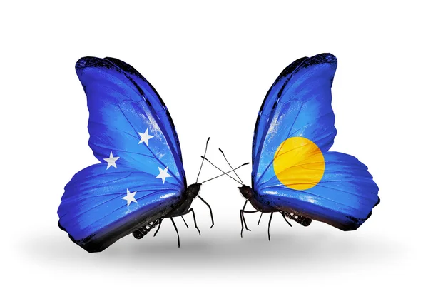 Butterflies with Micronesia and Palau flags — Stock Photo, Image