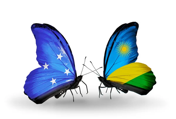 Butterflies with Micronesia and Rwanda flags — Stock Photo, Image