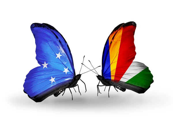 Motyle z flagami Mikronezja i Seszele — Zdjęcie stockowe