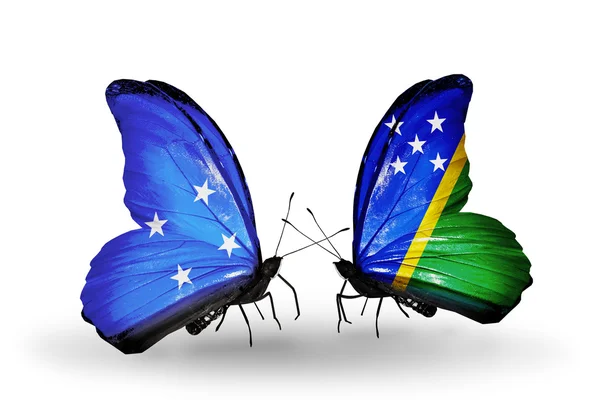 Motyle z flagami Mikronezja i Wyspy Salomona — Zdjęcie stockowe